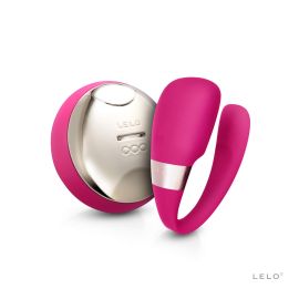 LELO Tiani 3 cerise couples massager with its polished gold wireless remote controller.